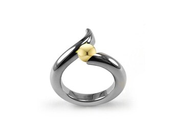 ONDE Swirl bypass ring with tension set gold sphere in stainless steel by Taormina Jewelry