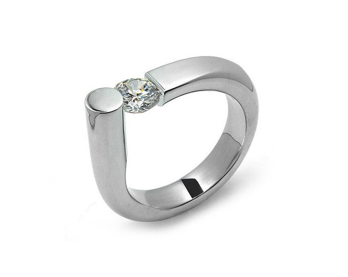 COLONNA Rounded style ring with a off centered tension set white sapphire in stainless steel by Taormina Jewelry