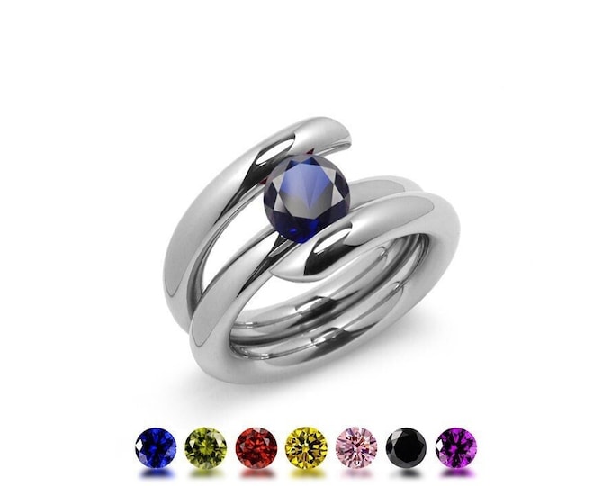 ILIANA High rise tubular bypass ring with tension set colored gemstone in stainless steel by Taormina Jewelry