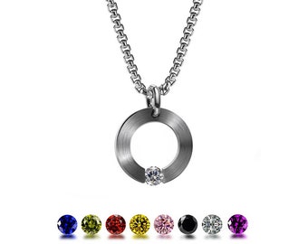 ABBRACCI Flat round pendant with tension set gemstones in stainless steel by Taormina Jewelry