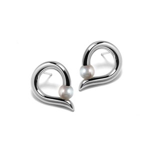 ONDE Teardrop shaped stud earrings with tension set white pearl in stainless steel by Taormina Jewelry image 1