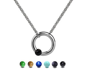 LUNA round tubular pendant hanging on a chain with off centered tension set semiprecious sphere in stainless steel by Taormina Jewelry