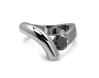 ONDE flat and tubular bypass ring with tension set black diamond in stainless steel by Taormina Jewelry