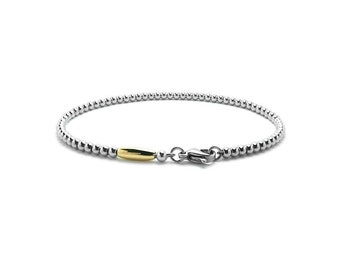 Thin beaded bracelet with oval gold element in stainless steel, 3mm by Taormina Jewelry