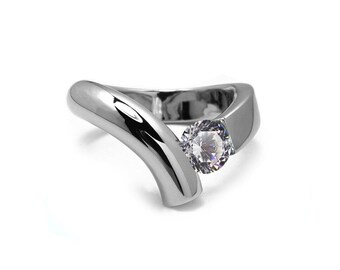 ONDE Flat and tubular bypass ring with tension set white sapphire in stainless steel by Taormina Jewelry