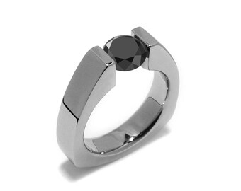 PYRAMID triangular shaped ring with tension set Black Diamond in stainless steel