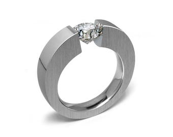 ABBRACCI tapered flat mounting ring with tension set white sapphire in stainless steel.