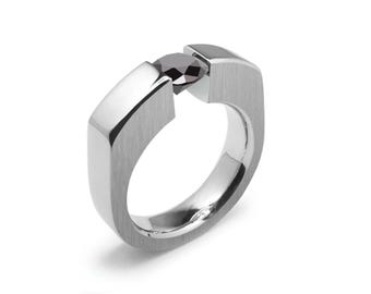 ABBRACCI Bold and flat men's ring with tension set black diamond in stainless steel