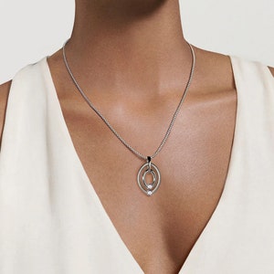 OVUM double oval tubular pendant with tension set colored gemstones in stainless steel by Taormina Jewelry image 9