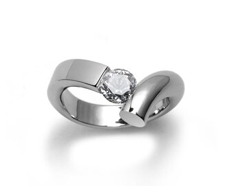 ONDE Flat and rounded tubular bypass ring with tension set white sapphire in stainless steel