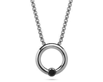 LUNA round tubular pendant with tension set black diamond in stainless steel