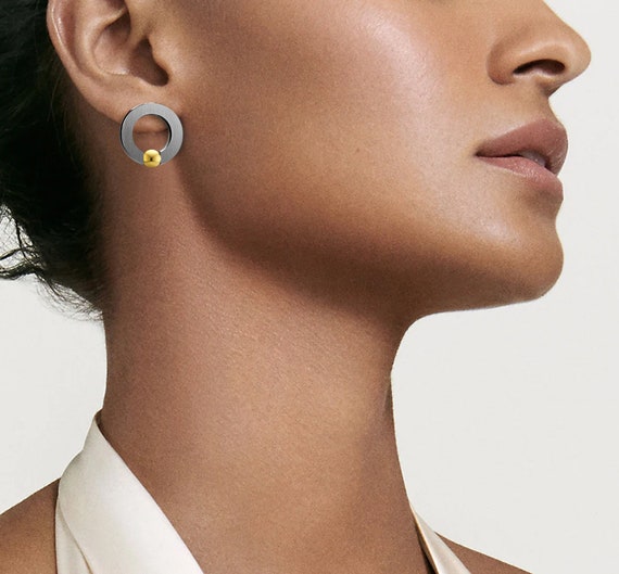 Tension set earrings shop