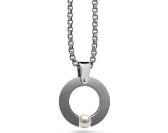 ABBRACCI round flat pendant with tension set white pearl in stainless steel