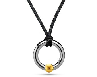LUNA round tubular pendant with tension set gold sphere in stainless steel