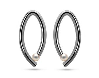 OVUM oval cat eye shaped drop stud earrings with tension set white pearls in stainless steel