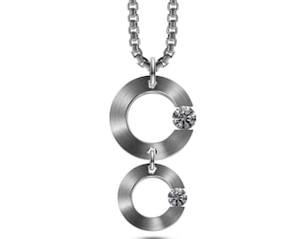 ABBRACCI double flat circle pendant with tension set white sapphires in stainless steel