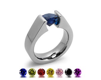 AMORE High setting ring with tension set colored gemstone in stainless steel
