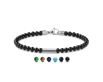 SPIRITUAL 4mm Black Onyx beads bracelet with tube element in stainless steel