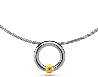 LUNA round tubular pendant with tension set gold sphere on a cable choker in stainless steel