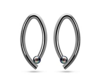 OVUM oval cat eye shaped drop stud earrings with tension set black pearls in stainless steel