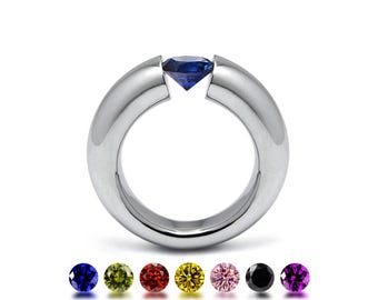 LUNA Tapered rounded ring with tension set colored gemstone in stainless steel