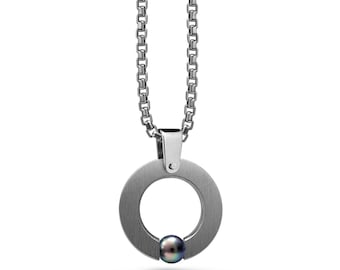 ABBRACCI round flat pendant with tension set black pearl in stainless steel