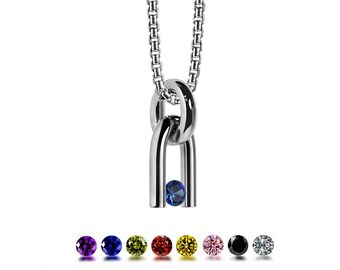 DIAPASON shaped pendant with tension set colored gemstone in stainless steel