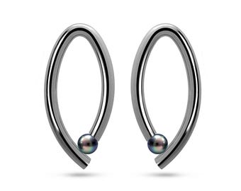 OVUM oval cat eye shaped drop stud earrings with tension set black pearls in stainless steel
