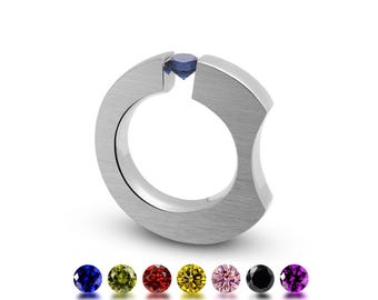 CELESTIAL tapered flat ergonomic ring with tension set sapphire in stainless steel