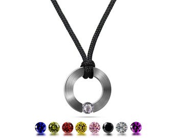 ABBRACCI flat round pendant on a cord with tension set gemstone in stainless steel