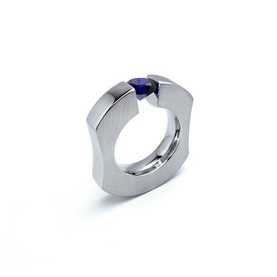0.75ct Blue Sapphire Lyre shaped Tension Set Ring in Stainless Steel by  Taormina Jewelry