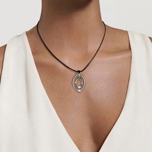 OVUM double oval tubular pendant with tension set colored gemstones in stainless steel by Taormina Jewelry image 10