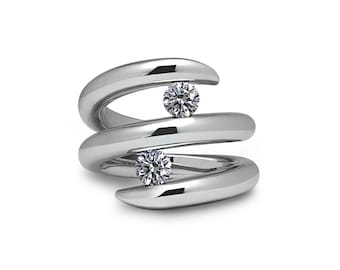 ONDE multi row bypass ring with two tension set white sapphires in stainless steel