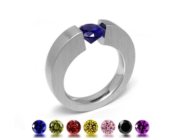 ABBRACCI tapered flat mounting ring with tension set colored gemstones in stainless steel