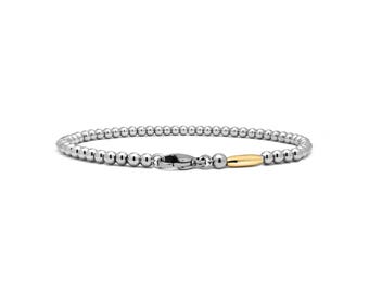 Thin 3mm stainless steel beaded bracelet with oval gold element