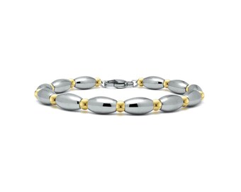 OLIVE Alternating oval and round gold beaded bracelet in stainless steel