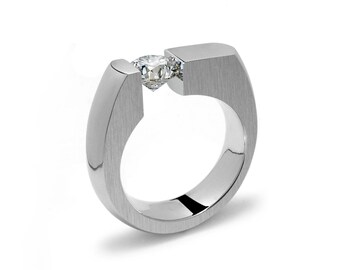 COLONNA Flat top ring with off centered tension set white sapphire in stainless steel