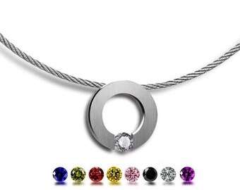 ABBRACCI round flat pendant with tension set colored sapphire on a cable choker in stainless steel