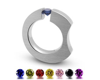 CELESTIAL tapered flat ergonomic ring with tension set sapphire in stainless steel