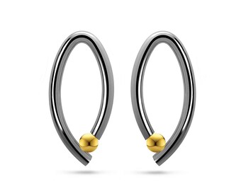 OVUM oval cat eye shaped drop stud earrings with tension set gold spheres in stainless steel