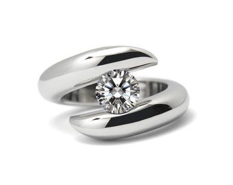 ONDE tubular bypass ring with tension set white sapphire in stainless steel