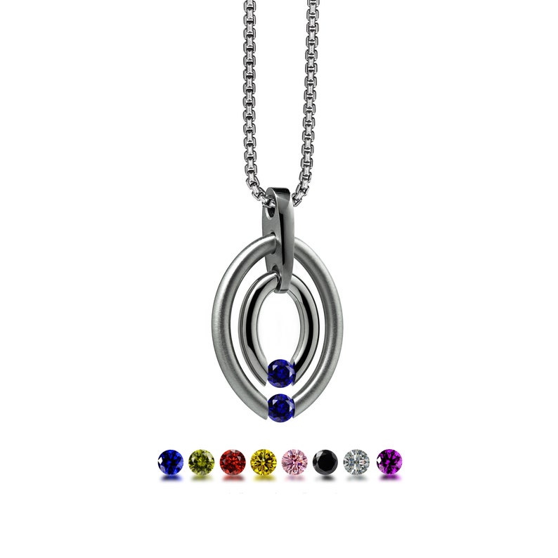 OVUM double oval tubular pendant with tension set colored gemstones in stainless steel by Taormina Jewelry blue sapphire