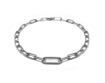Paperclip style chain necklace with oversize center link  in stainless steel