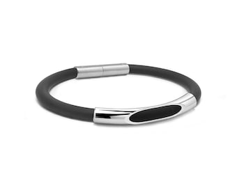 Tubular black rubber bracelet with see through tube element in stainless steel