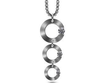 ABBRACCI Triple flat circle pendant with tension set white sapphires in stainless steel