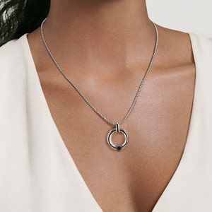 LUNA round tubular pendant with tension set black diamond in stainless steel by Taormina Jewelry image 3