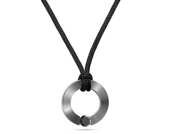 ABBRACCI round flat pendant with tension set black diamond in stainless steel