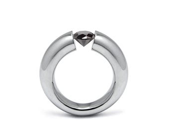 LUNA Tapered rounded tension set ring with black diamond in stainless steel
