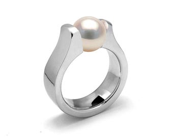 MAREA Flat and rounded high mounting ring with tension set white pearl in stainless steel