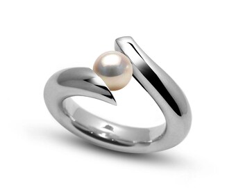 ONDE Swirl Bypass ring with tension set white pearls in stainless steel